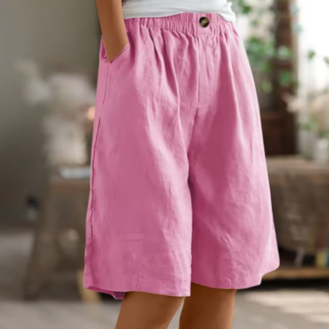 Women's high waist wide leg shorts featuring practical pockets, designed for comfortable, casual summer style.