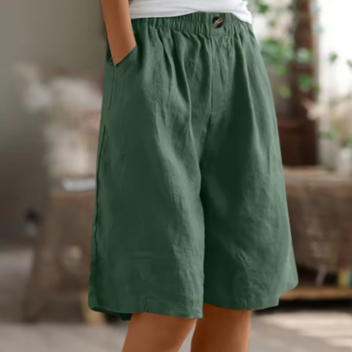 Close-up of comfortable fabric on women's high waist wide leg shorts, perfect for summer.