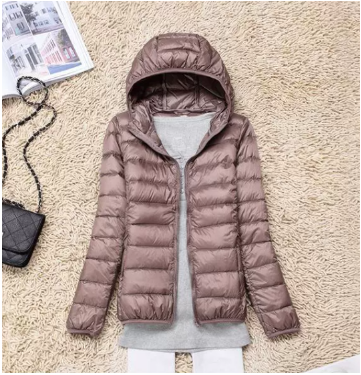 Women's lightweight hooded puffer jacket, perfect for fall fashion & everyday wear.