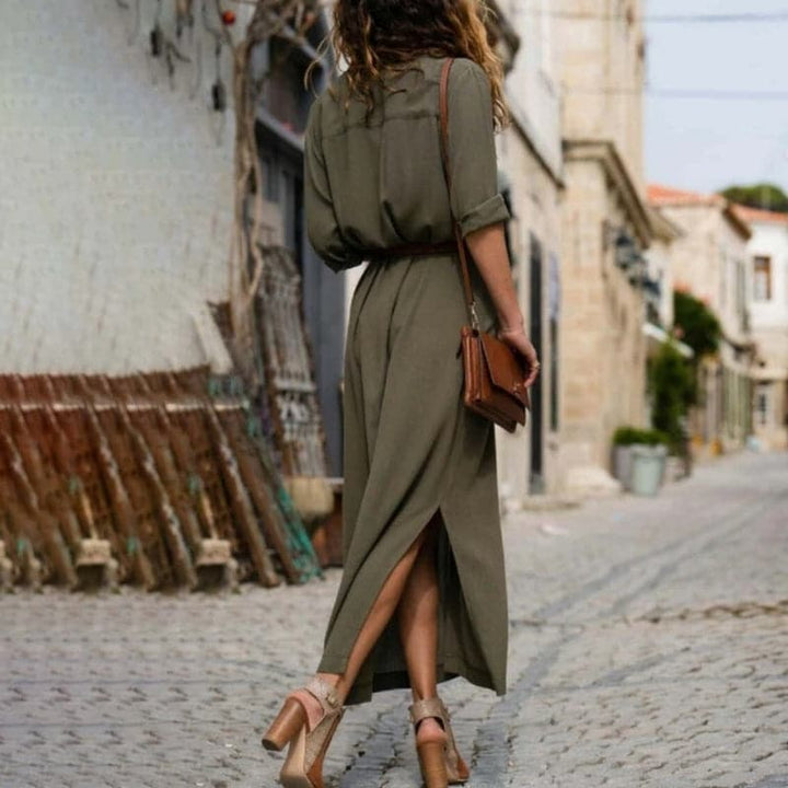 Stylish women's midi dress, featuring a classic shirt dress design & a flattering belt. Versatile & timeless.
