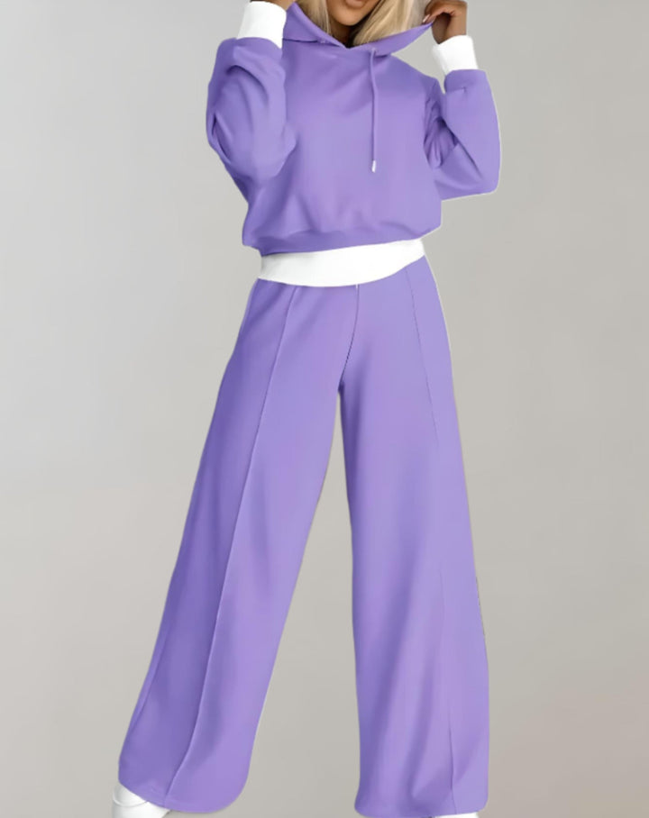 Stylish women's loungewear set featuring a relaxed-fit hoodie and wide-leg pants.