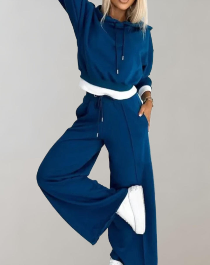 Athleisure outfit: women's comfy hoodie and wide-leg pants tracksuit set for everyday wear.