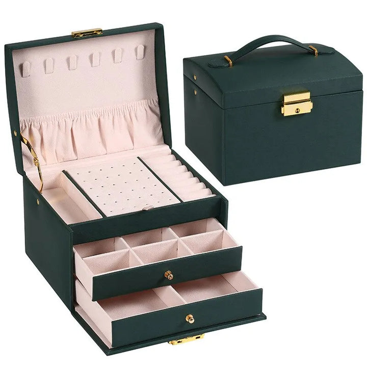 Women's 3-layer leather jewelry box with velvet lining for organized storage of rings, necklaces & earrings.