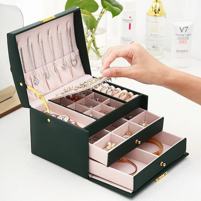 Gift-ready women's three-layer jewelry box, ensuring organized & safe storage for all rings, necklaces & earrings.