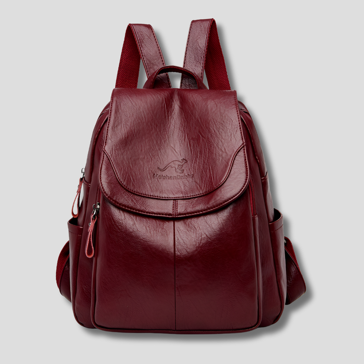 Front view of a stylish women's leather backpack with a sleek, modern design.