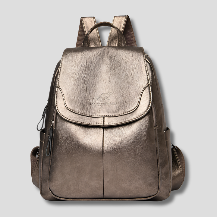 Side profile of the anti-theft leather backpack, highlighting its slim and elegant silhouette.