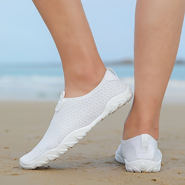 Stylish women's rapid-dry water shoes featuring anti-slip grip, great for beach, swim, and outdoor adventures.