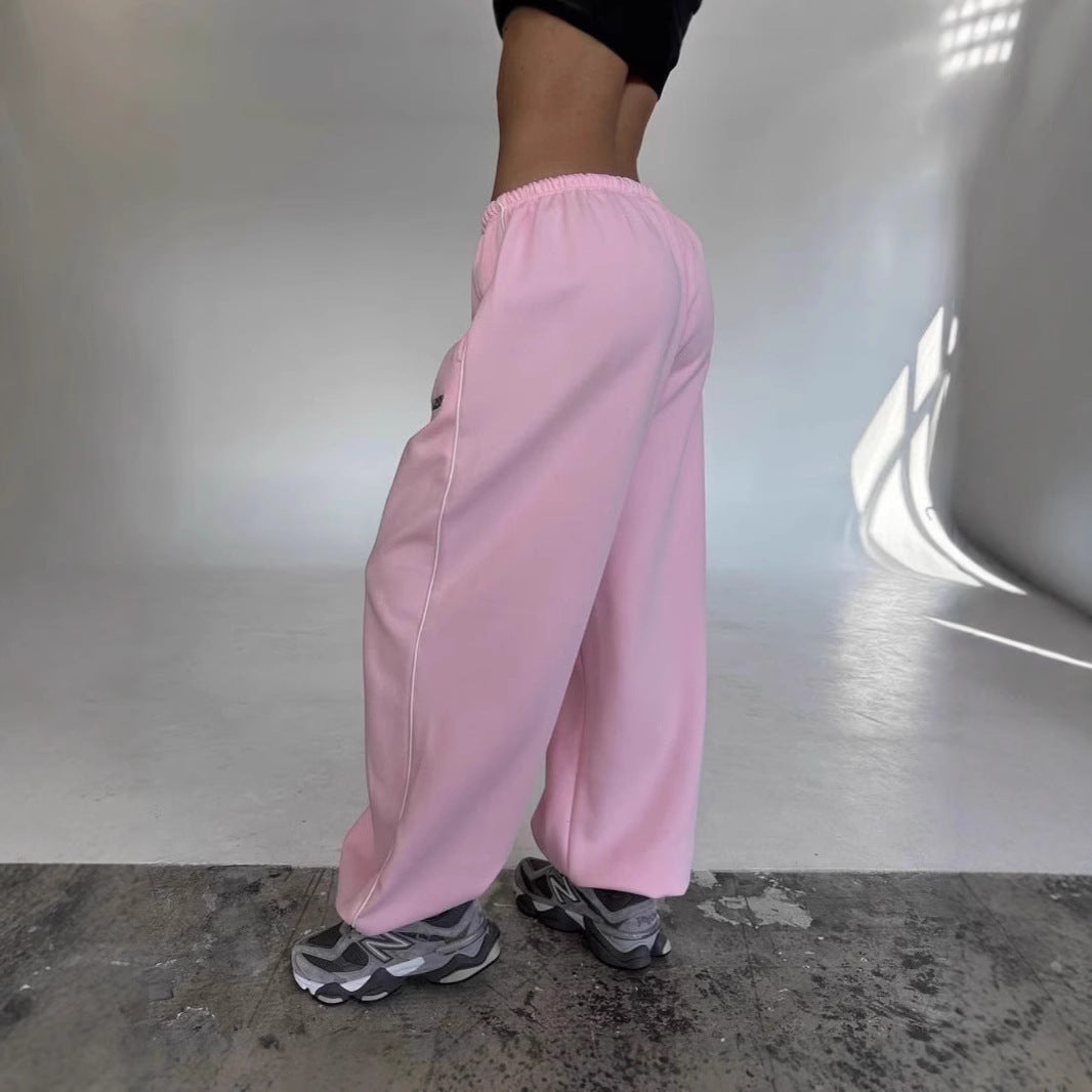 Loungewear perfection: soft women's sweatpants in a baggy fit with side stripe.