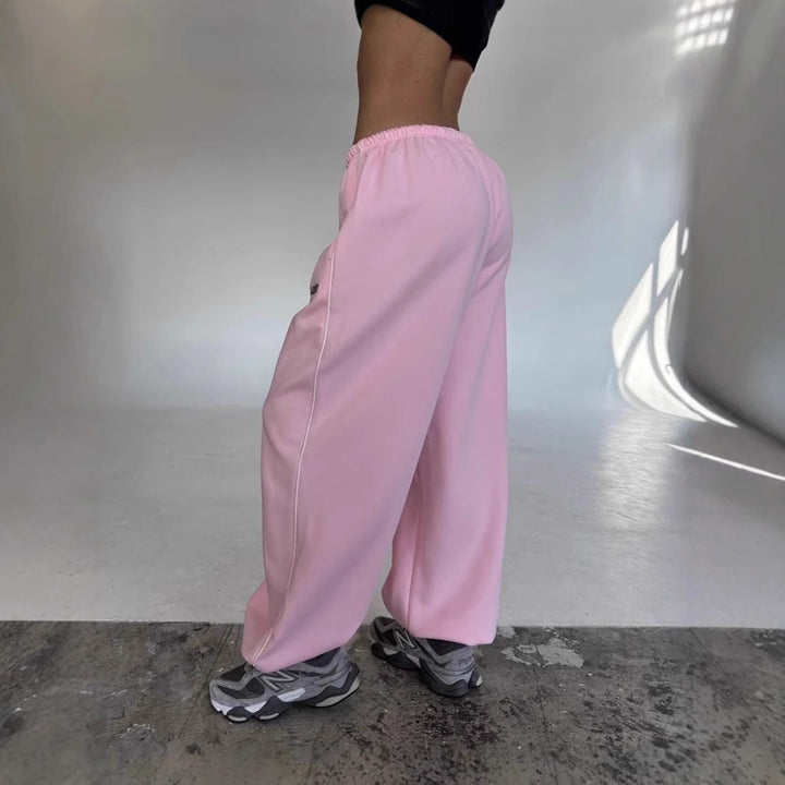 Loungewear perfection: soft women's sweatpants in a baggy fit with side stripe.