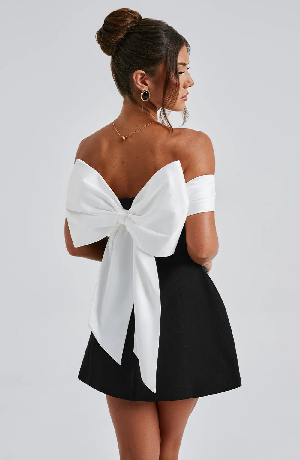 Sleek black formal mini dress, perfect for special occasions