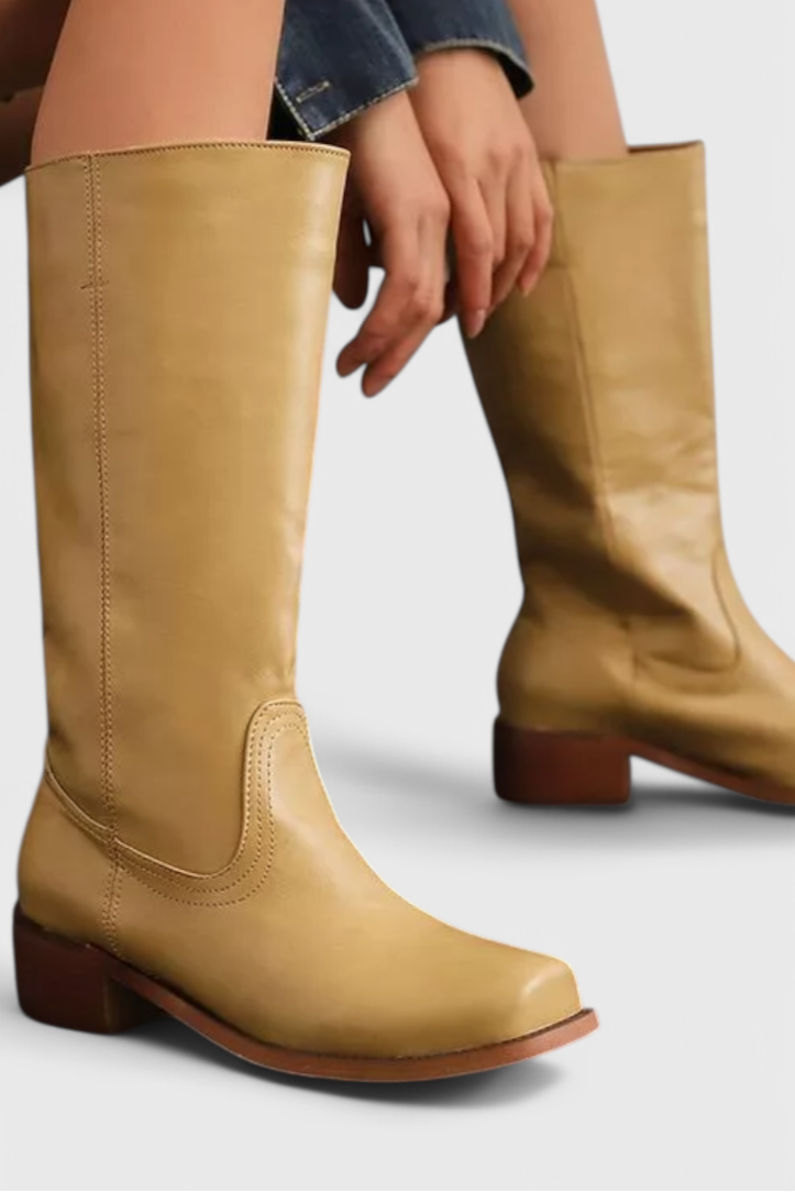 Comfortable and fashionable women's knee high boots, featuring an easy pull-on design and stacked heel.