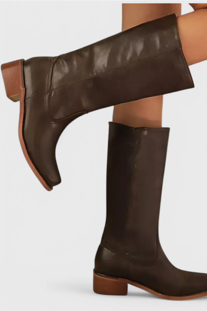 Practical pull-on women's knee high boots with a stable stacked heel.