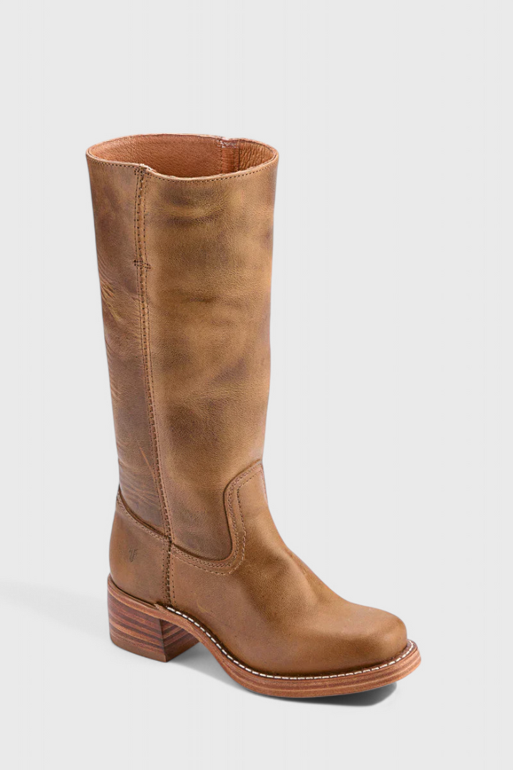 Stylish fall fashion: women's knee high boots with a comfortable stacked heel.