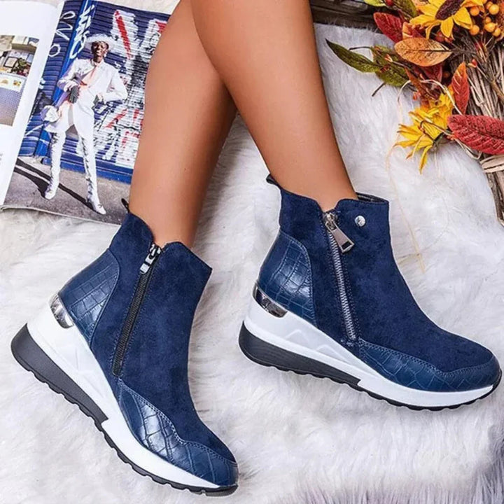Durable waterproof ankle boots for women, featuring a secure side zipper closure.