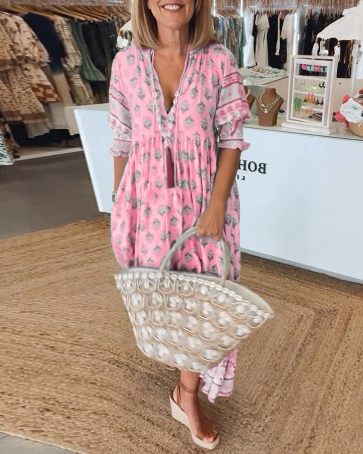 Stylish pink floral midi dress, a must-have women's day dress.
