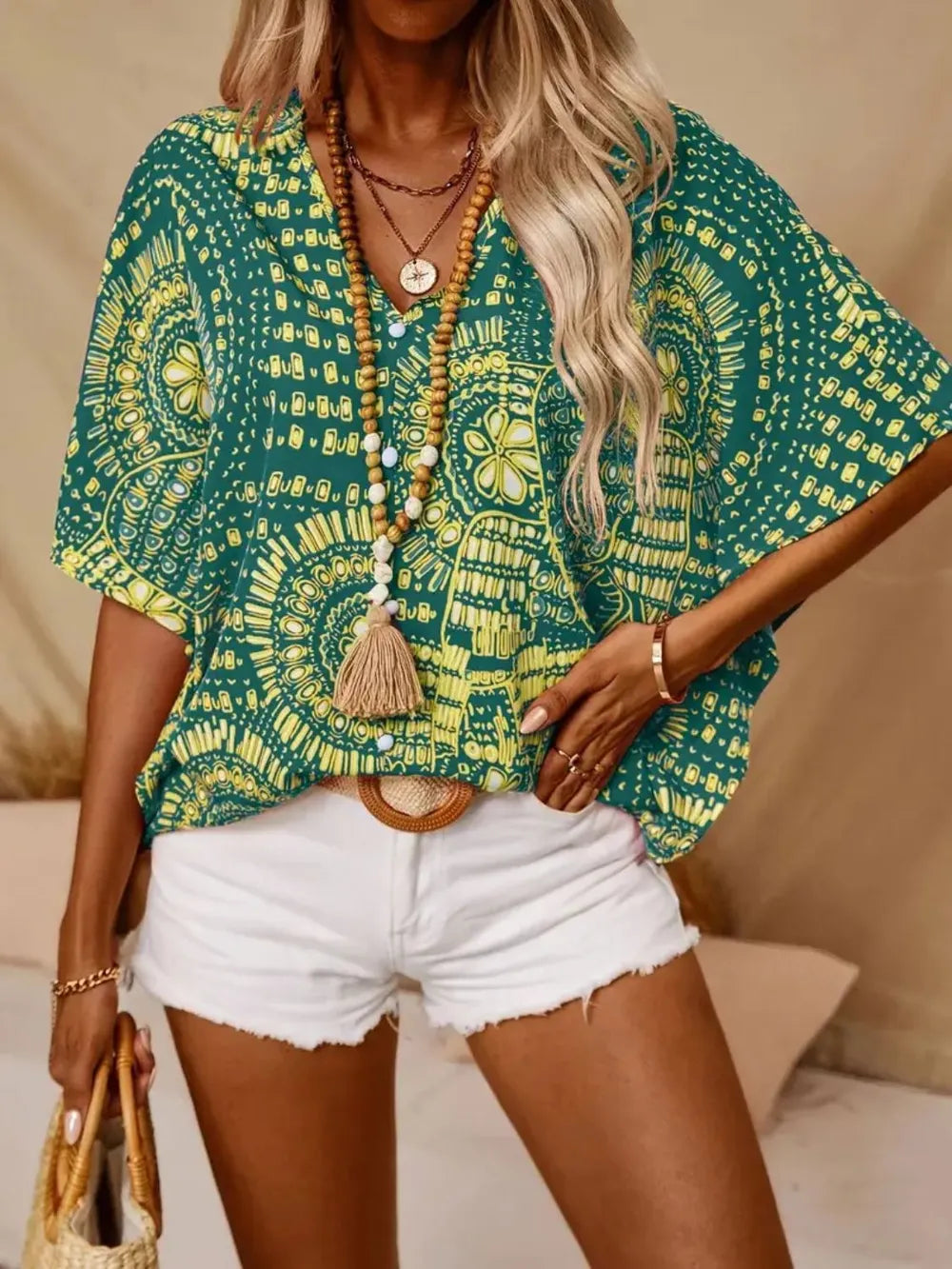 Boho chic printed v-neck shirt, ideal for sunny days
