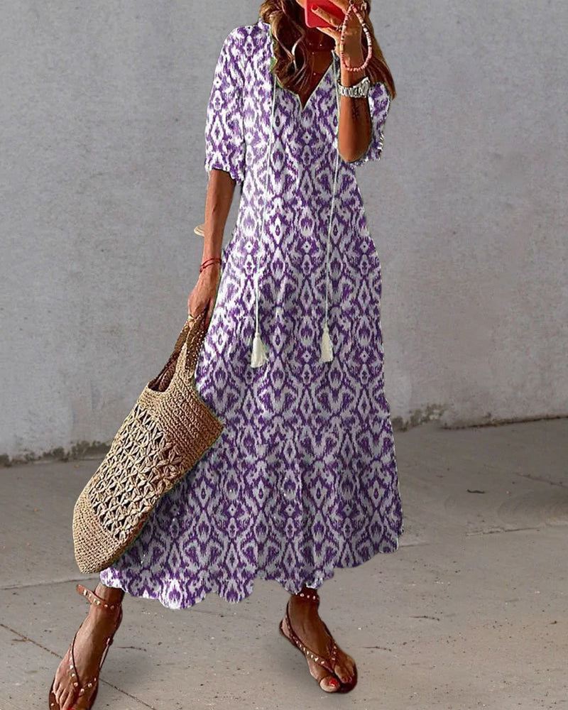 Comfortable women's boho V-neck printed maxi dress, perfect for spring vacation or casual wear.