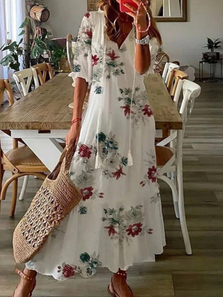 Elegant women's V-neck printed dress with a vintage boho design, ideal for summer fashion.