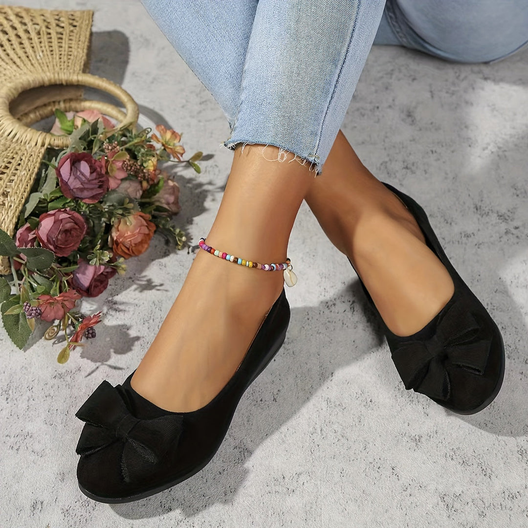 Elegant women's footwear: bow detail wedge ballet flats, perfect for effortless daily style.