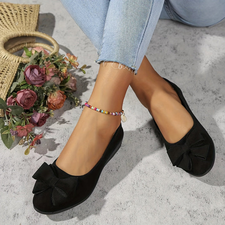 Elegant women's footwear: bow detail wedge ballet flats, perfect for effortless daily style.