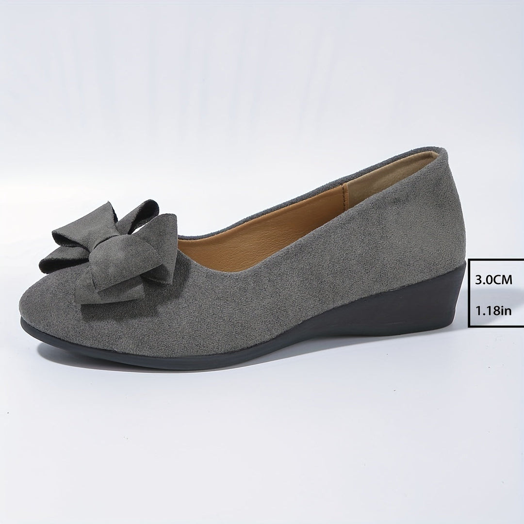 Women's classic bow detail wedge flats, perfect comfortable everyday casual shoes.