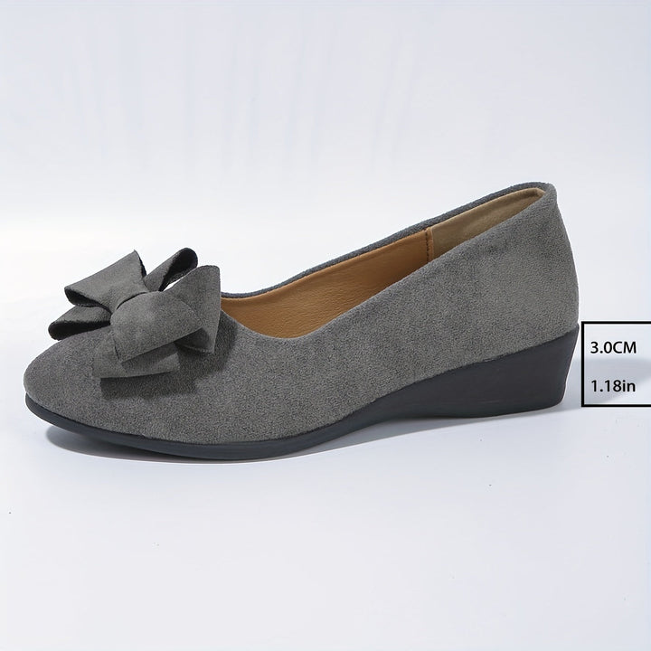 Women's classic bow detail wedge flats, perfect comfortable everyday casual shoes.