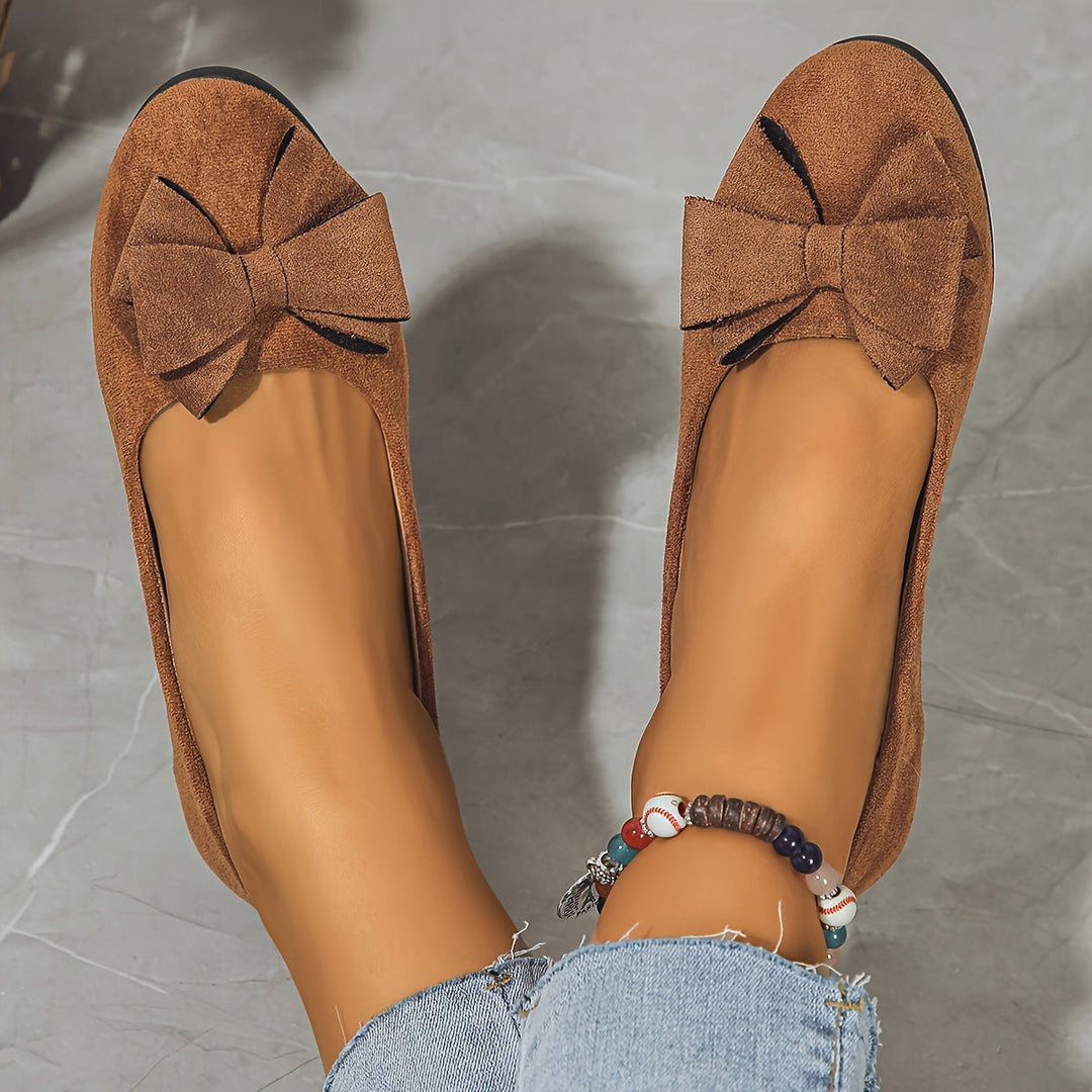 Women's fashionable wedge ballet flats with bow detail, perfect for versatile daily outfits.
