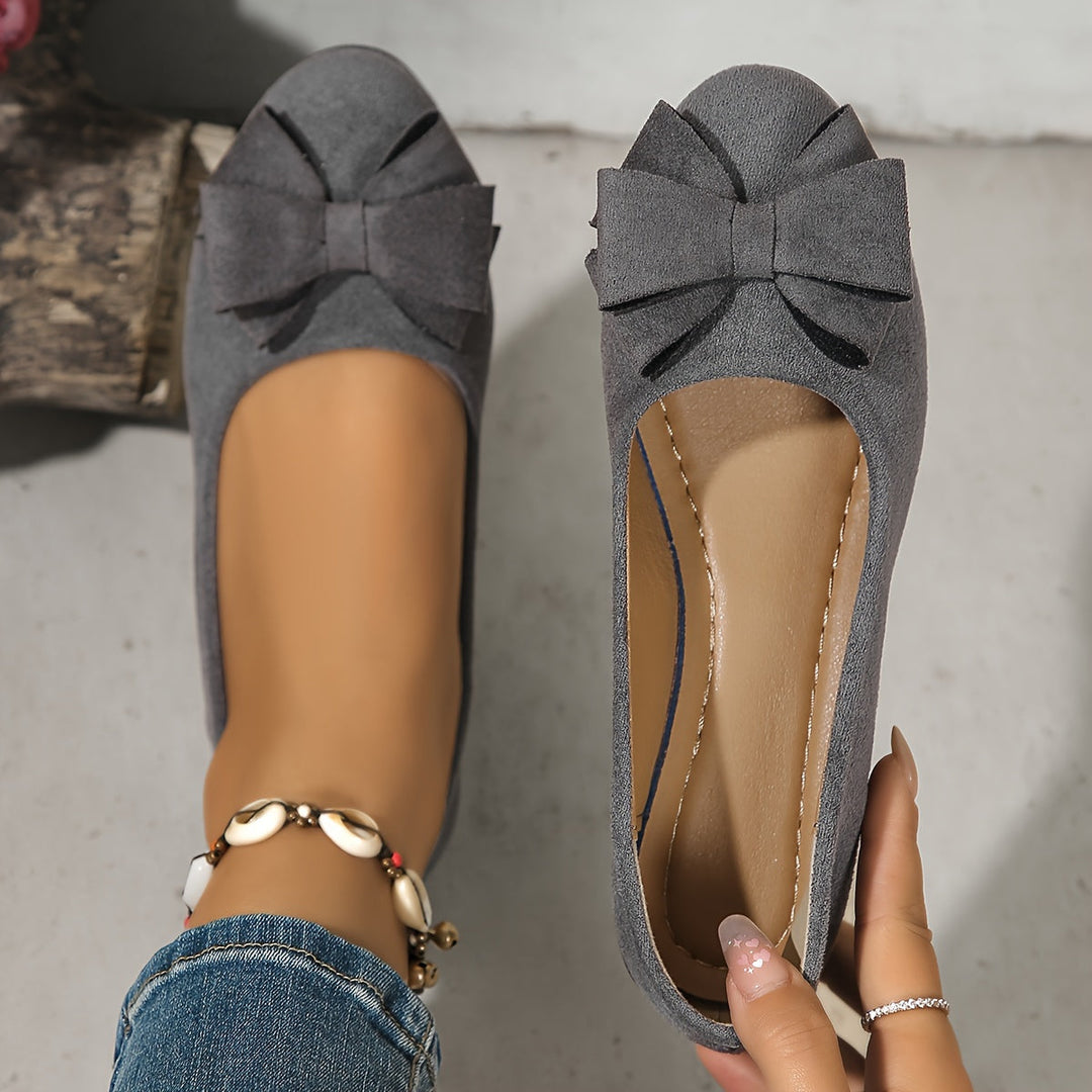 Stylish women's footwear: bow detail wedge ballet flats, perfect for effortless daily elegance.
