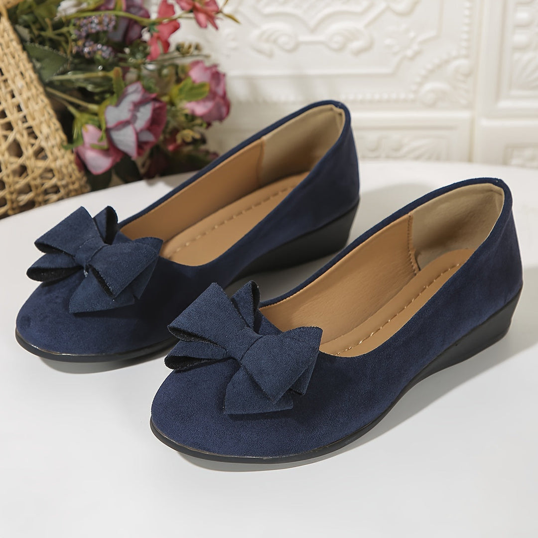 Comfortable women's classic wedge ballet flats with bow, versatile for everyday casual wear.