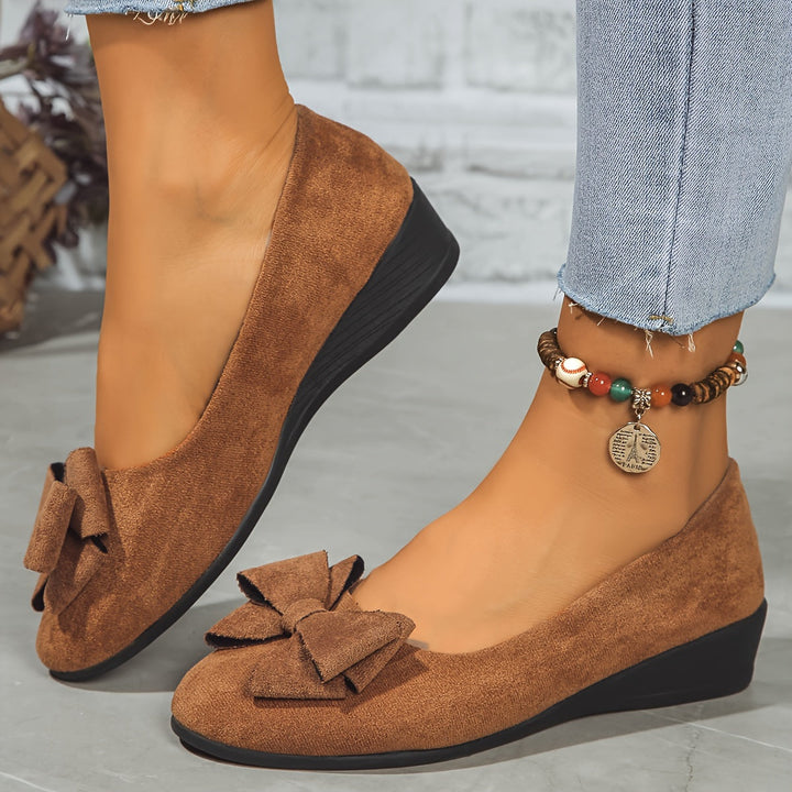 Effortless style women's wedge ballet flats with charming bow, perfect for daily elegant footwear.