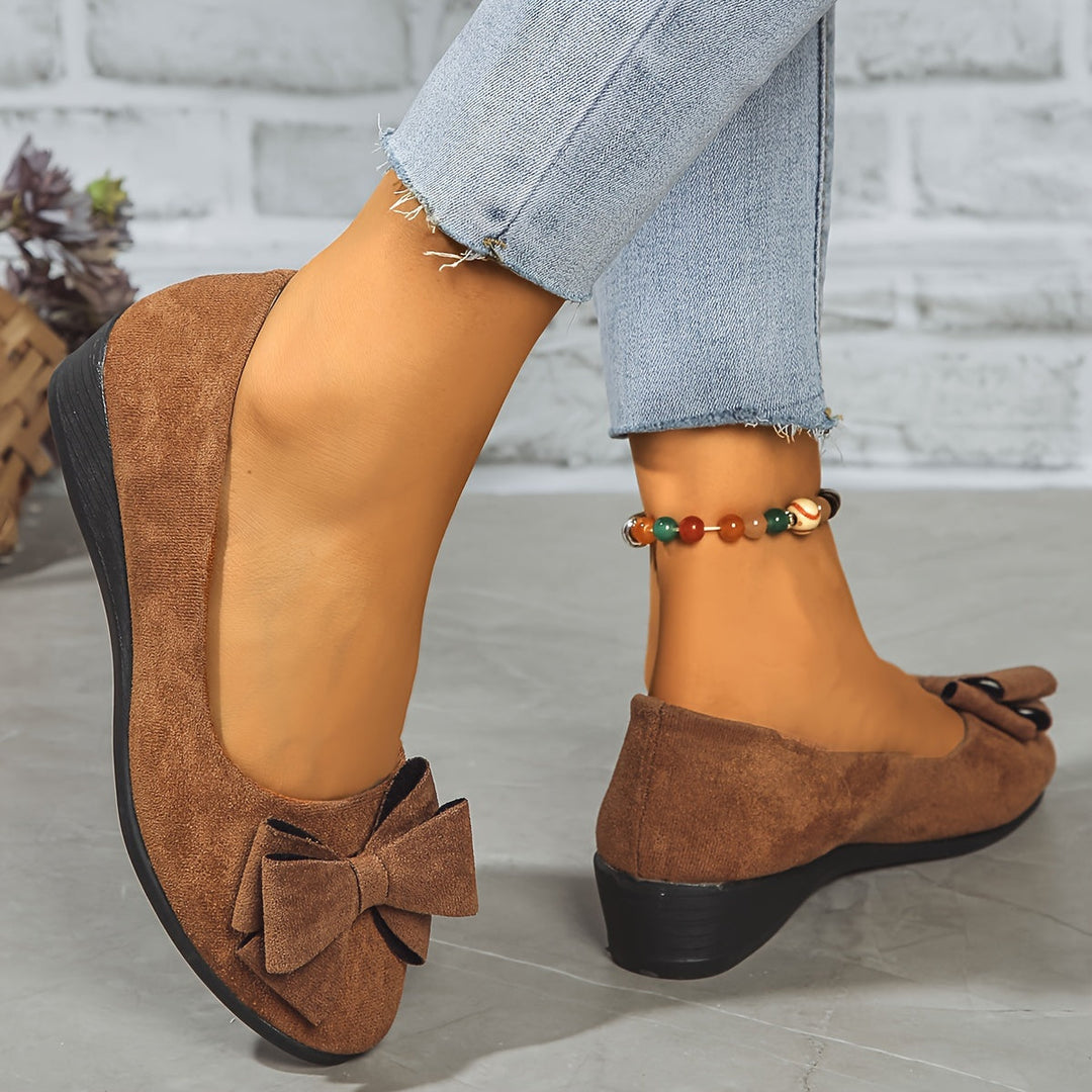 Everyday elegant women's wedge ballet flats with decorative bow, comfortable for all-day wear.