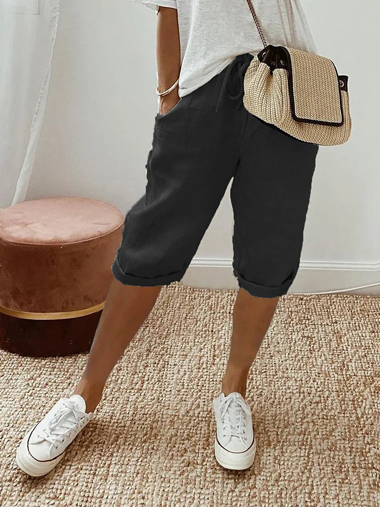 Women's breathable knee-length capri pants in a relaxed fit for effortless comfort & summer casual wear.
