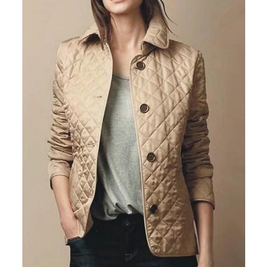 Women's chic button-down quilted jacket, perfect for fall fashion. Versatile and comfortable outerwear.