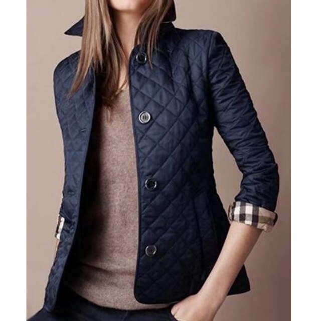 Comfortable women's quilted button-down jacket, a versatile layering piece for casual fall and winter looks.