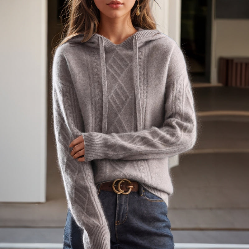 Chic women's hooded cable pullover top for versatile casual wear. Ideal layering piece for autumn fashion.