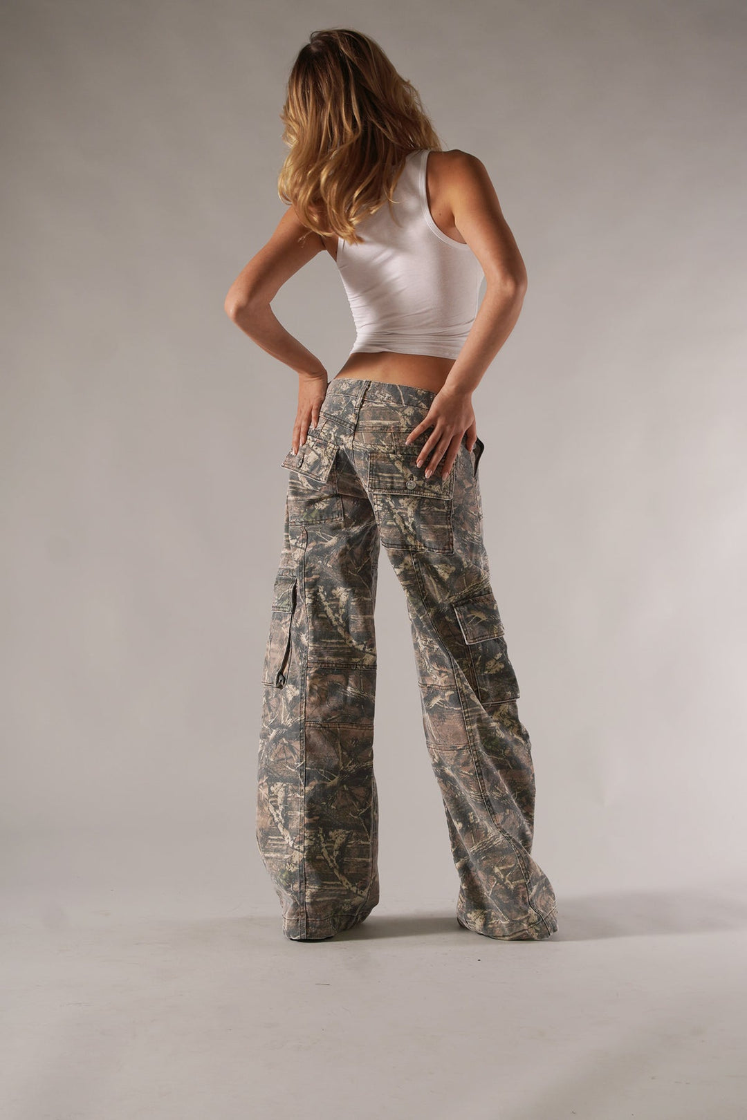 Stylish camouflage print wide leg trousers for women, perfect for casual wear.