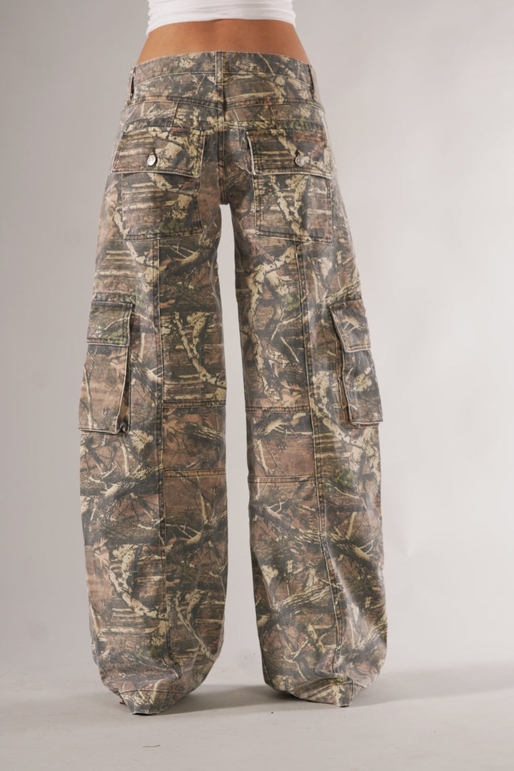 Streetwear-inspired women's utility trousers with a bold camouflage design.