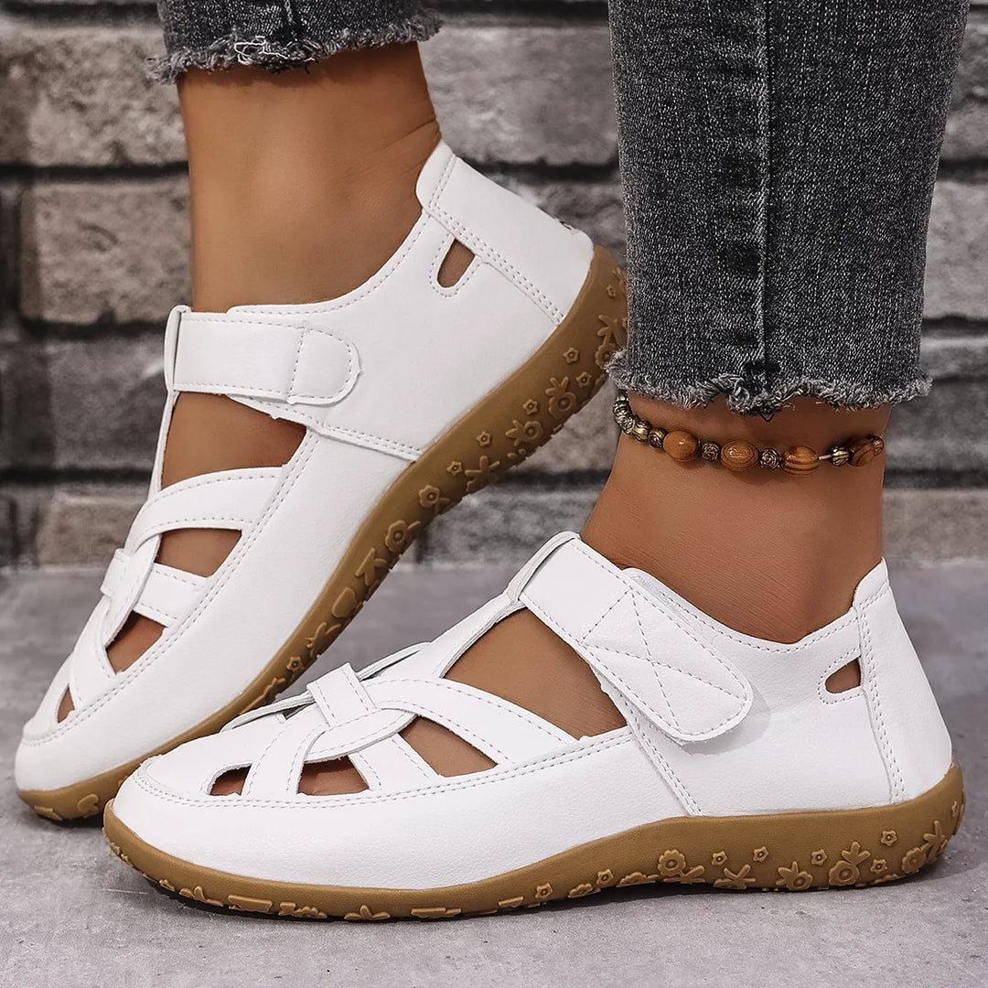 Chic summer sandals for women, offering a cutout design and easy-to-adjust velcro fastening.