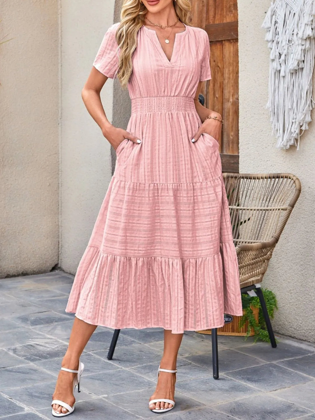 Women's casual flowy midi dress in a vibrant floral print, perfect for summer.