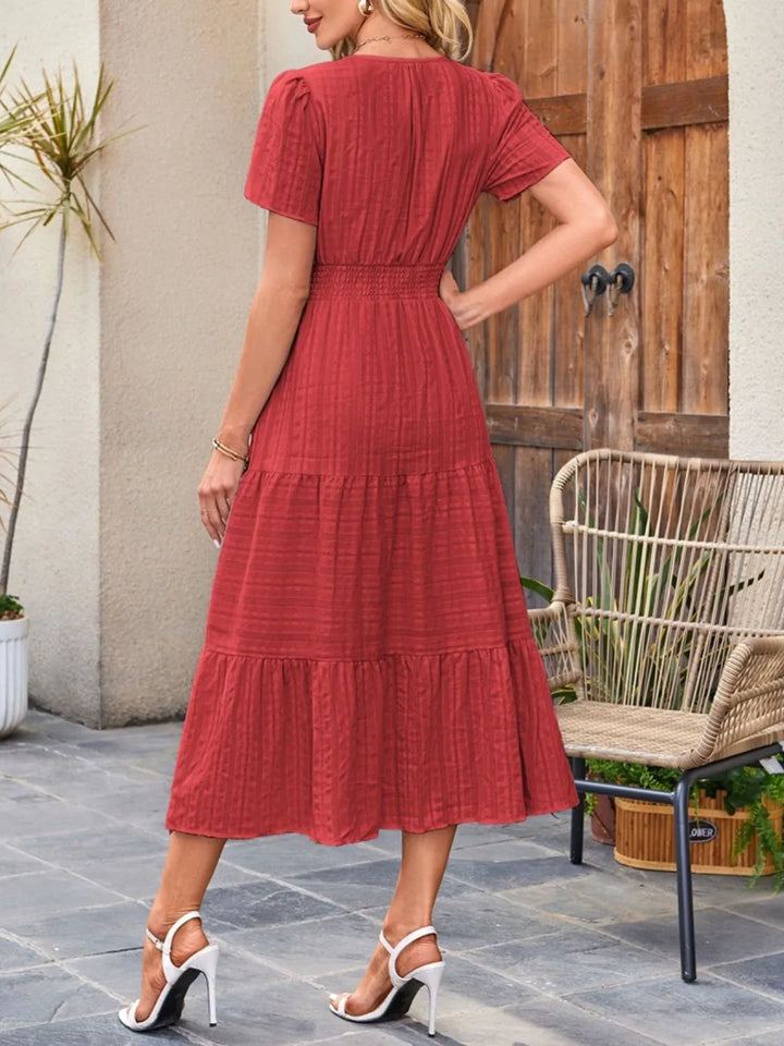 Modest midi dress with short sleeves, offering both style and comfort.