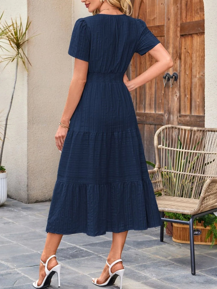 A perfect summer midi dress for women, featuring a relaxed, flowy cut.