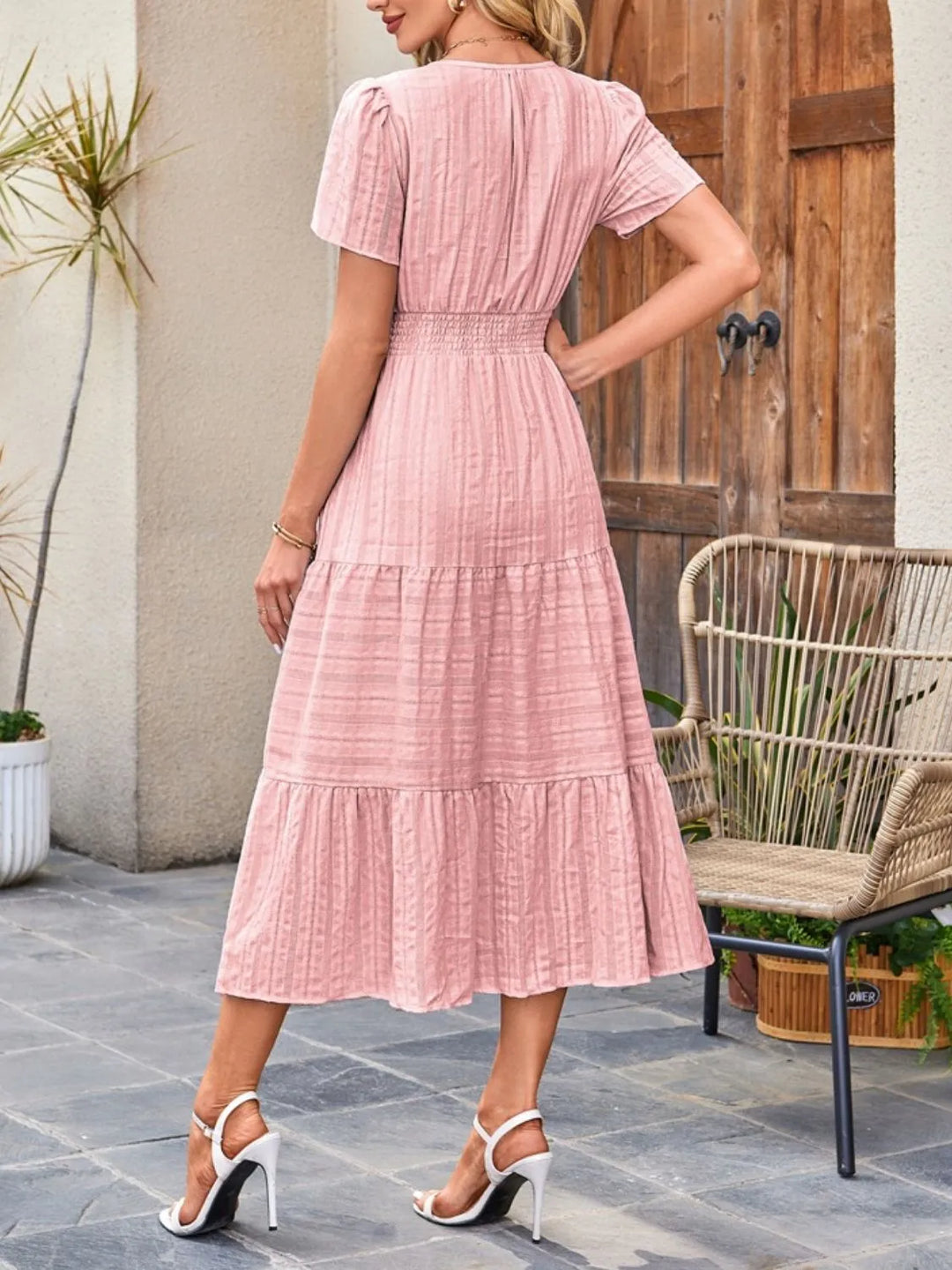 Short sleeve midi dress with convenient side pockets, ideal for everyday wear.