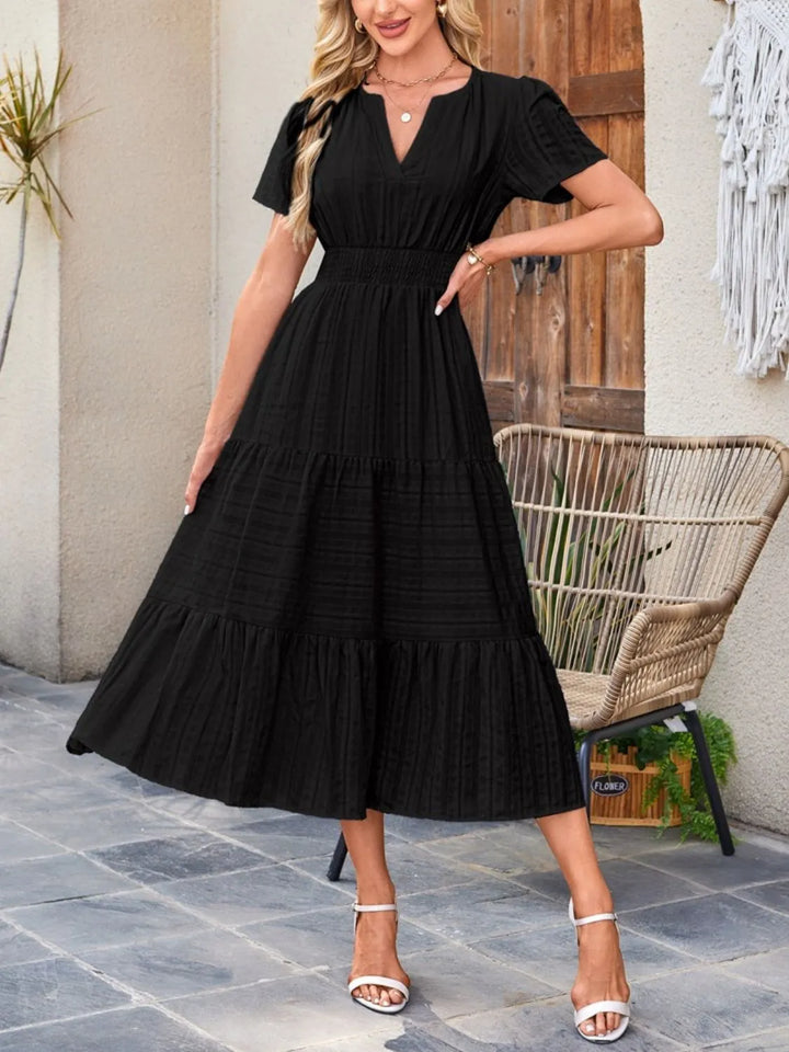 Stylish women's short sleeve dress, a versatile choice for any occasion.