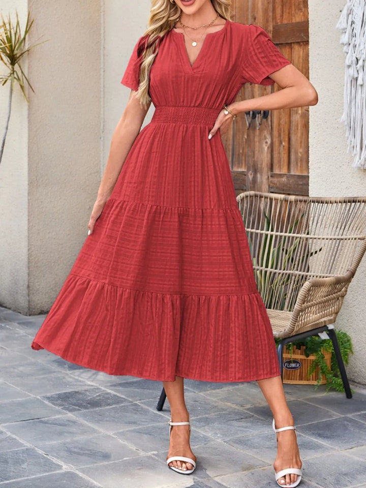 Versatile women's flowy midi dress, perfect for brunches or casual outings.