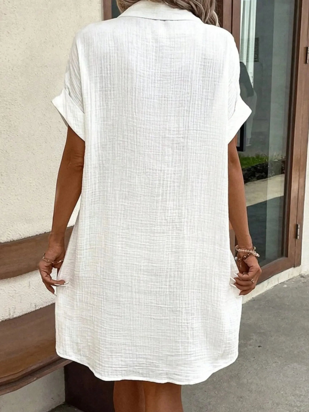 Model wearing a comfortable casual shirt dress, perfect for everyday wear