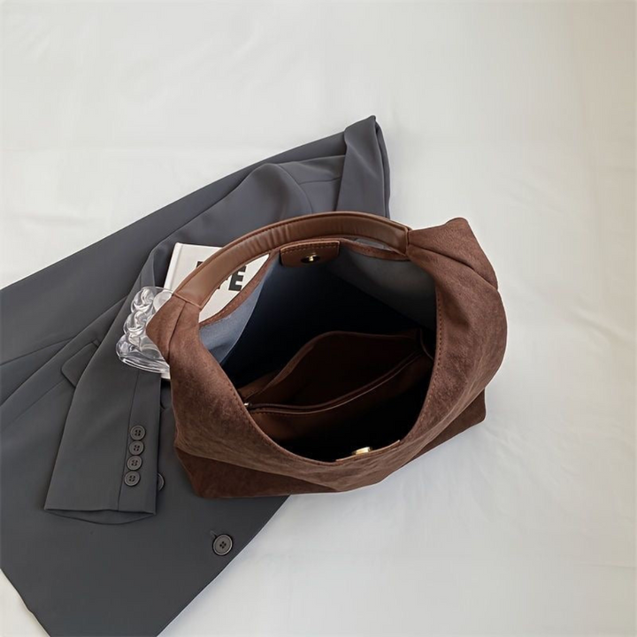 Stylish women's fashion tote bag, spacious & durable for daily errands or weekend travel. Comfortable shoulder carry.