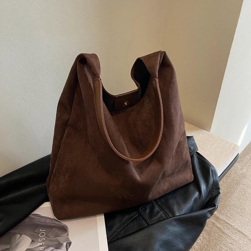 Everyday women's tote bag with ample space for work or travel. Comfortable shoulder straps & durable design.