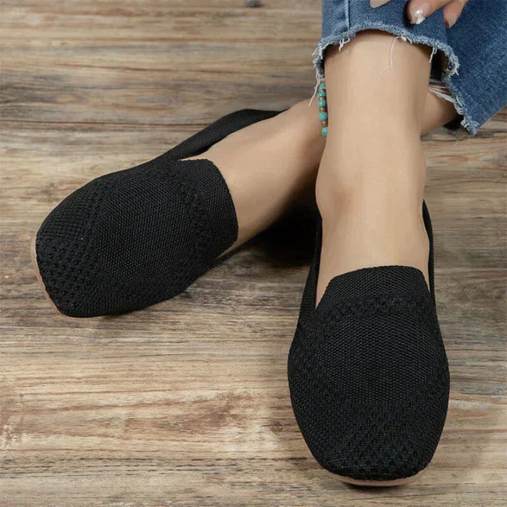 Close-up of comfortable women's slip-on loafers featuring a modern round toe silhouette.