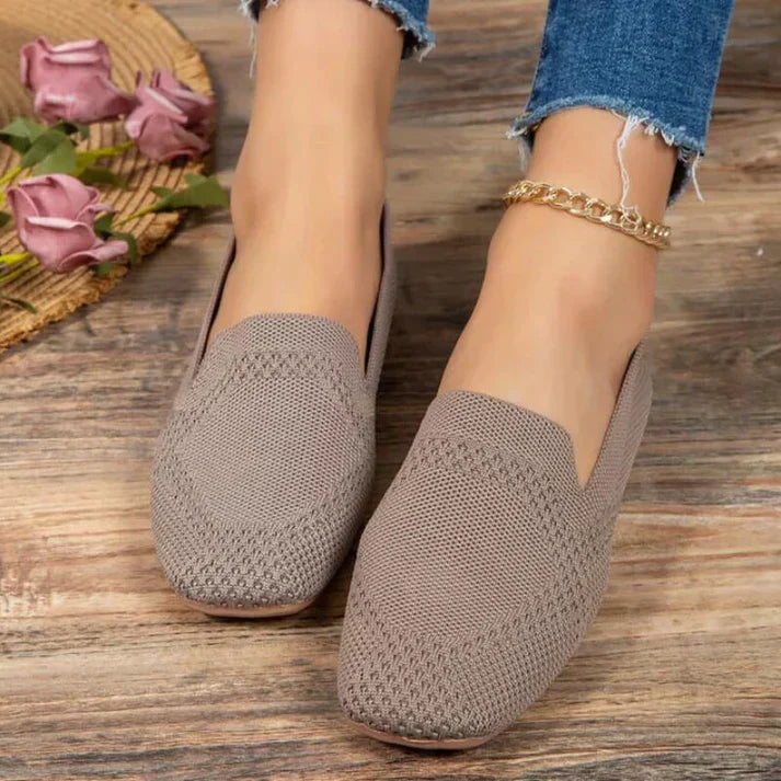 Stylish womens loafers in a versatile tan color, showcasing easy slip-on design.