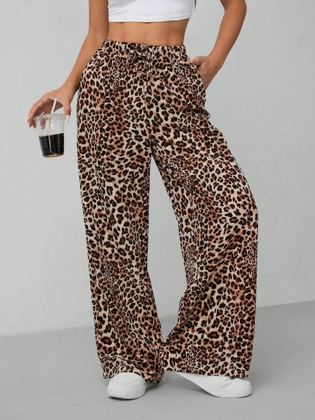 Women's chic leopard print wide leg pants with drawstring, relaxed fit for summer style.